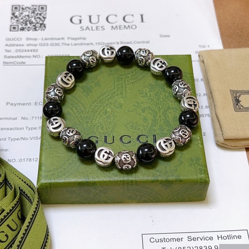 G*u*i bracelets